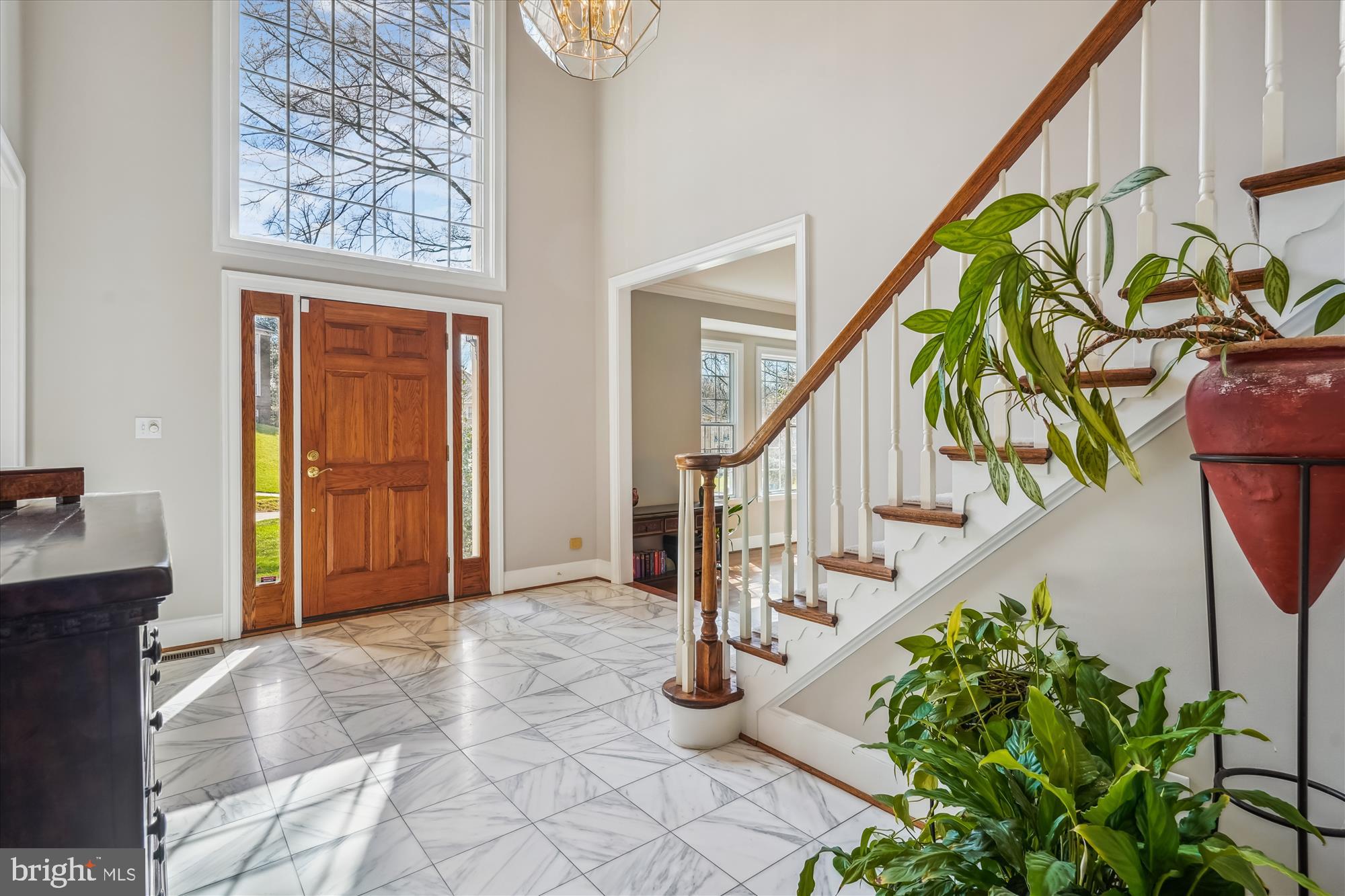 6100 Solitaire Way McLean, VA 22101 - Photo 7 of 60 a view of an entryway with wooden floor