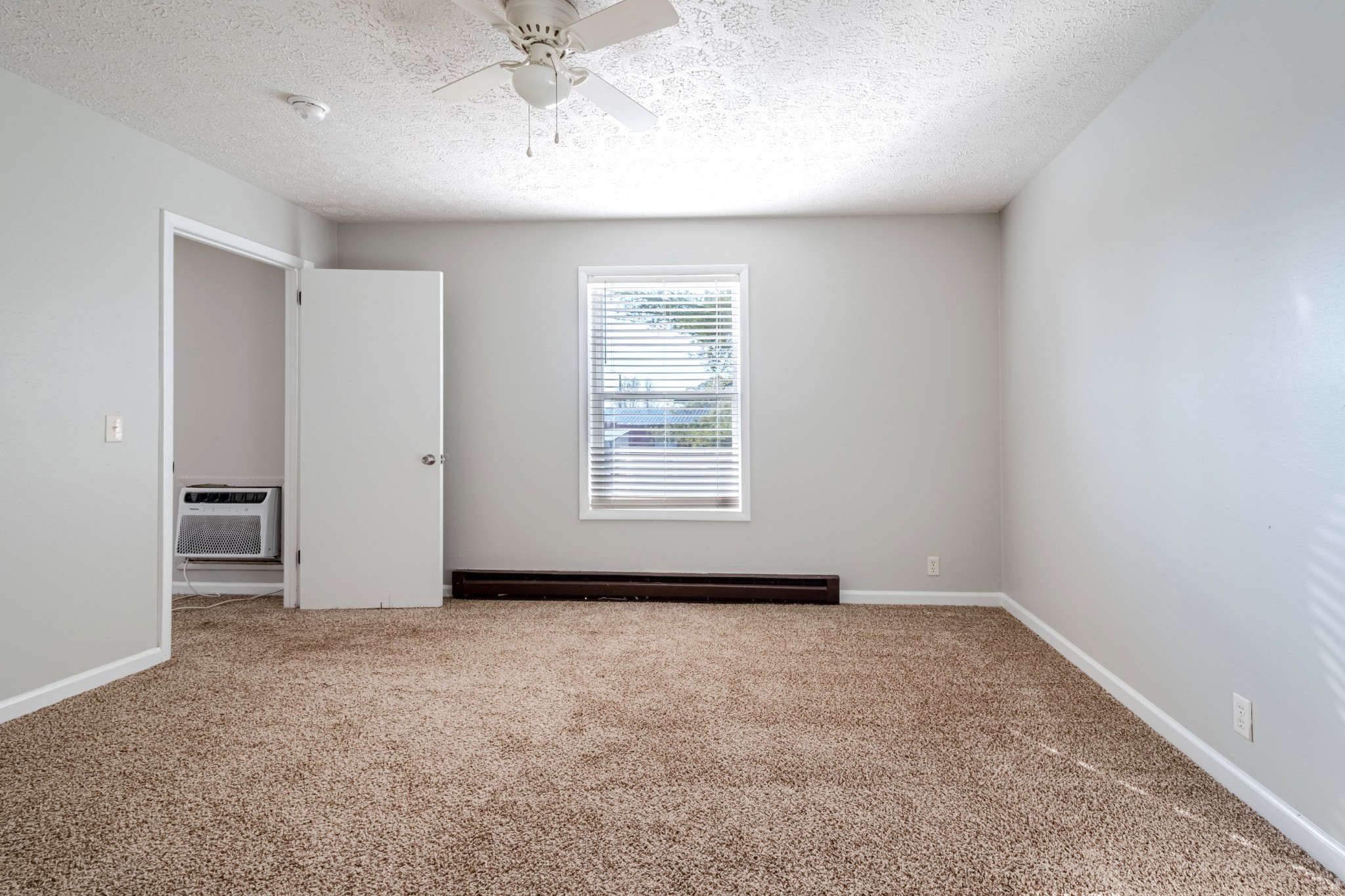 1059 Woods Ferry Road, Unit 16 Gallatin, TN 37066 - Photo 4 of 8 an empty room with a empty space and windows