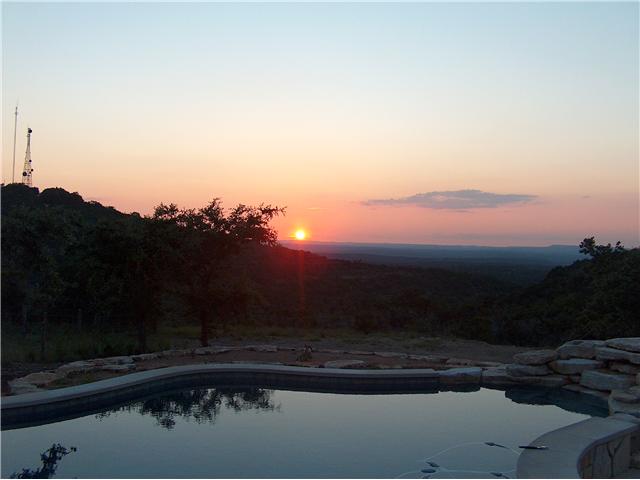 20717 Hamilton Pool Road Dripping Springs, TX 78620 - Photo 1 of 1 a view of swimming pool from lake