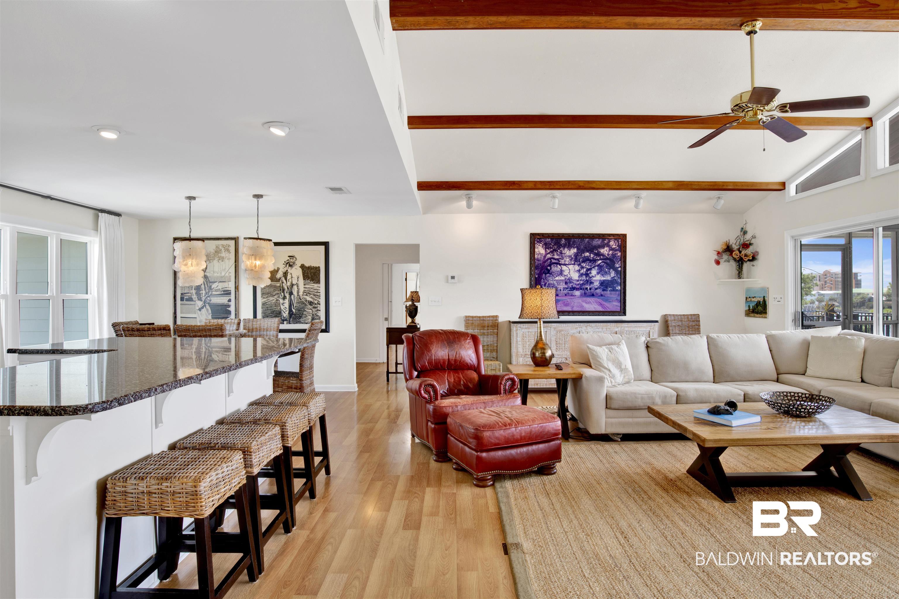 30538 River Road Orange Beach, AL 36561 - Photo 23 of 78 Living area featuring light wood finished floors, ceiling fan, beamed ceiling, and recessed lighting