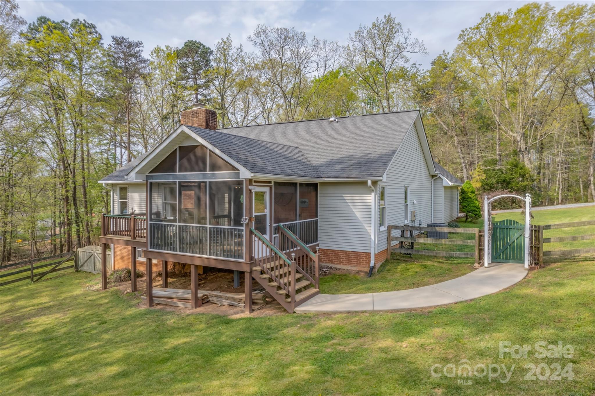 467 Lake Sandy Plains Road Tryon, NC 28782 - Photo 30 of 41 a view of a house with a yard and sitting area