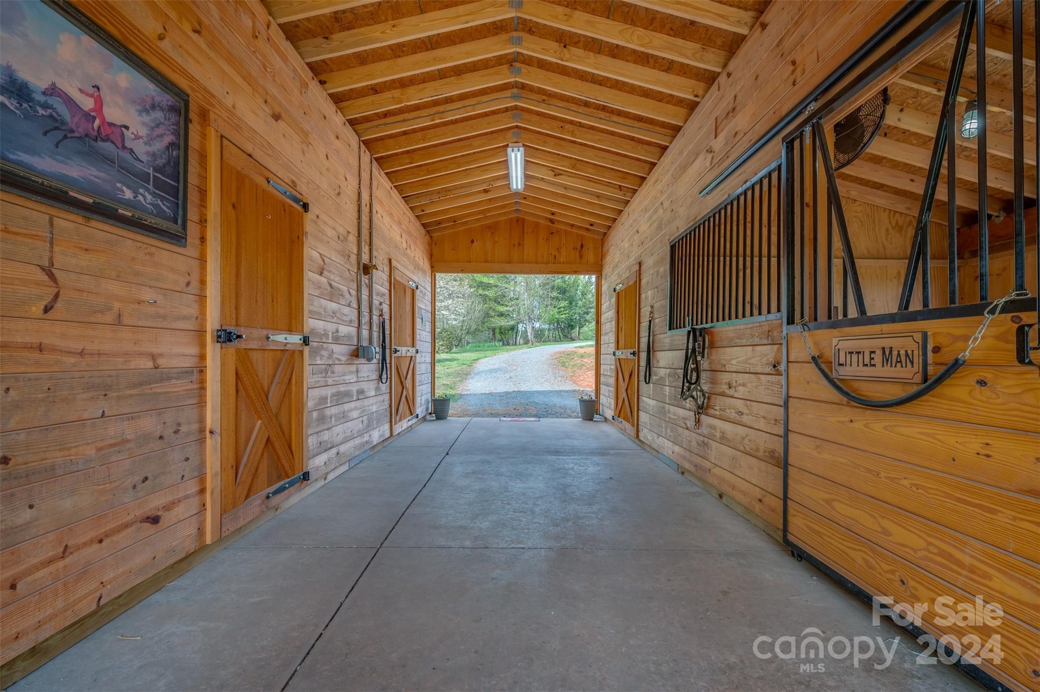467 Lake Sandy Plains Road Tryon, NC 28782 - Photo 3 of 41 a view of porch with a door and wooden walls