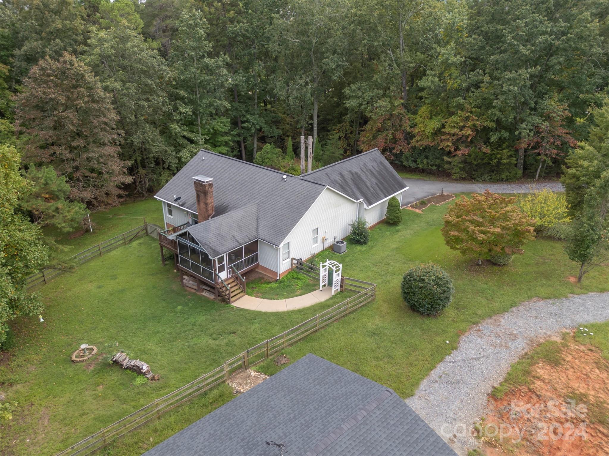 467 Lake Sandy Plains Road Tryon, NC 28782 - Photo 31 of 41 an aerial view of a house with a yard