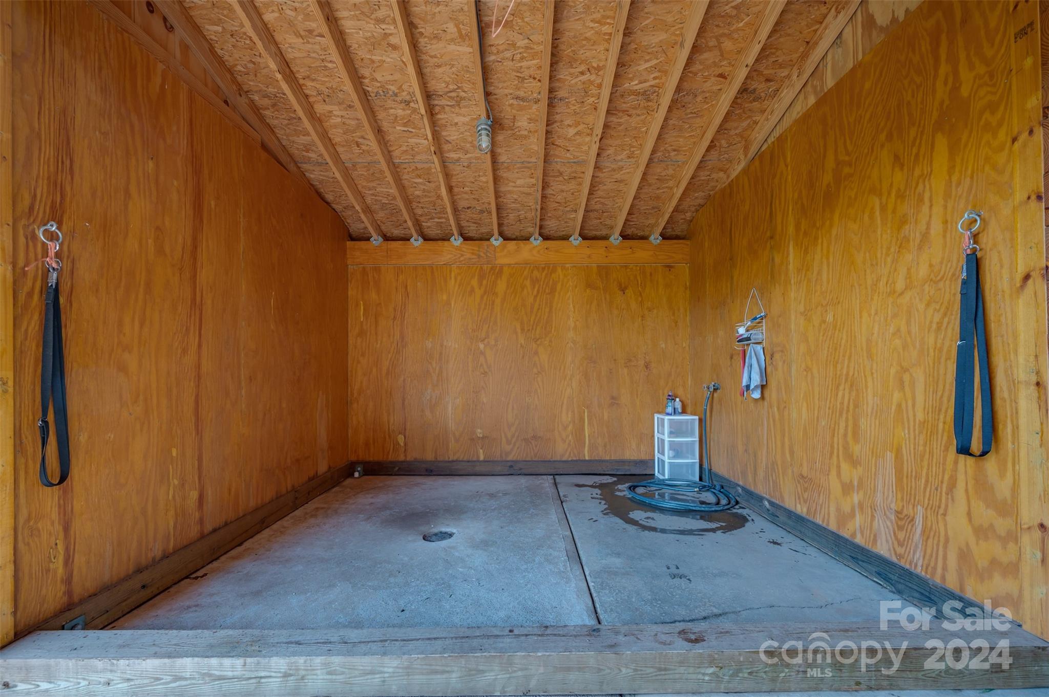 467 Lake Sandy Plains Road Tryon, NC 28782 - Photo 36 of 41 a view of a room with wooden walls
