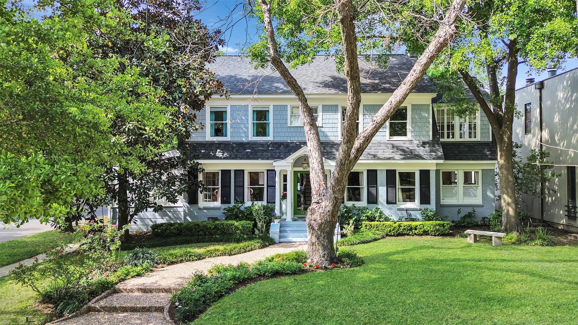 1836 Wroxton Road Houston, TX 77005 - Photo 2 of 42 This home sits prominently on the corner of Kent. View from the street.