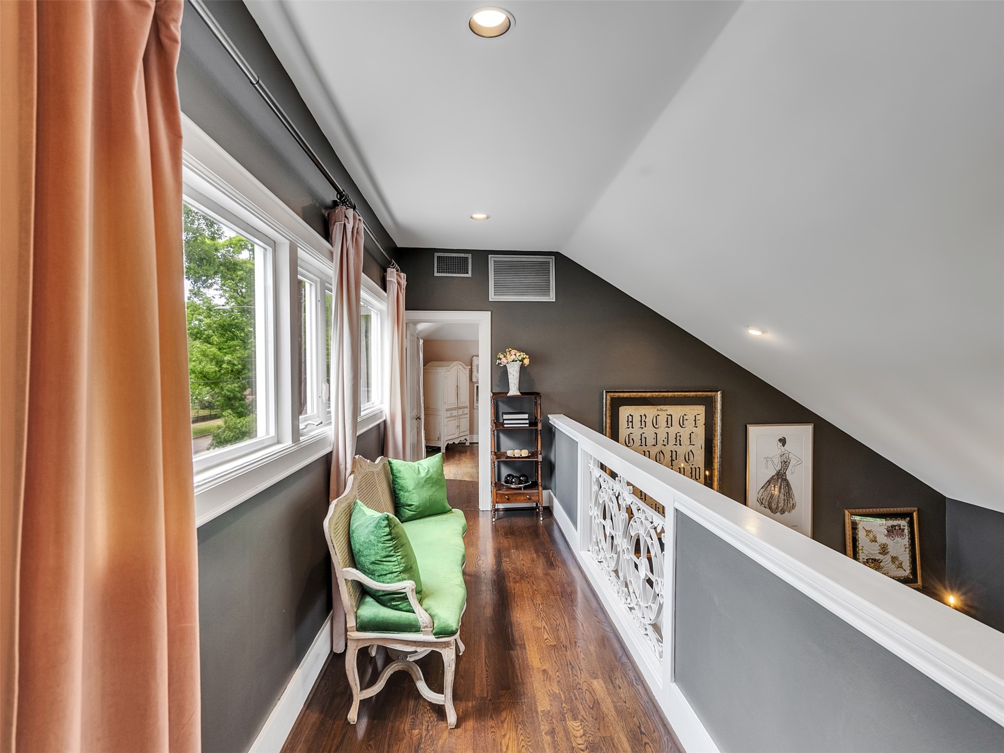 1836 Wroxton Road Houston, TX 77005 - Photo 28 of 42 Light-filled walkway landing separates the primary retreat from the secondary bedrooms.