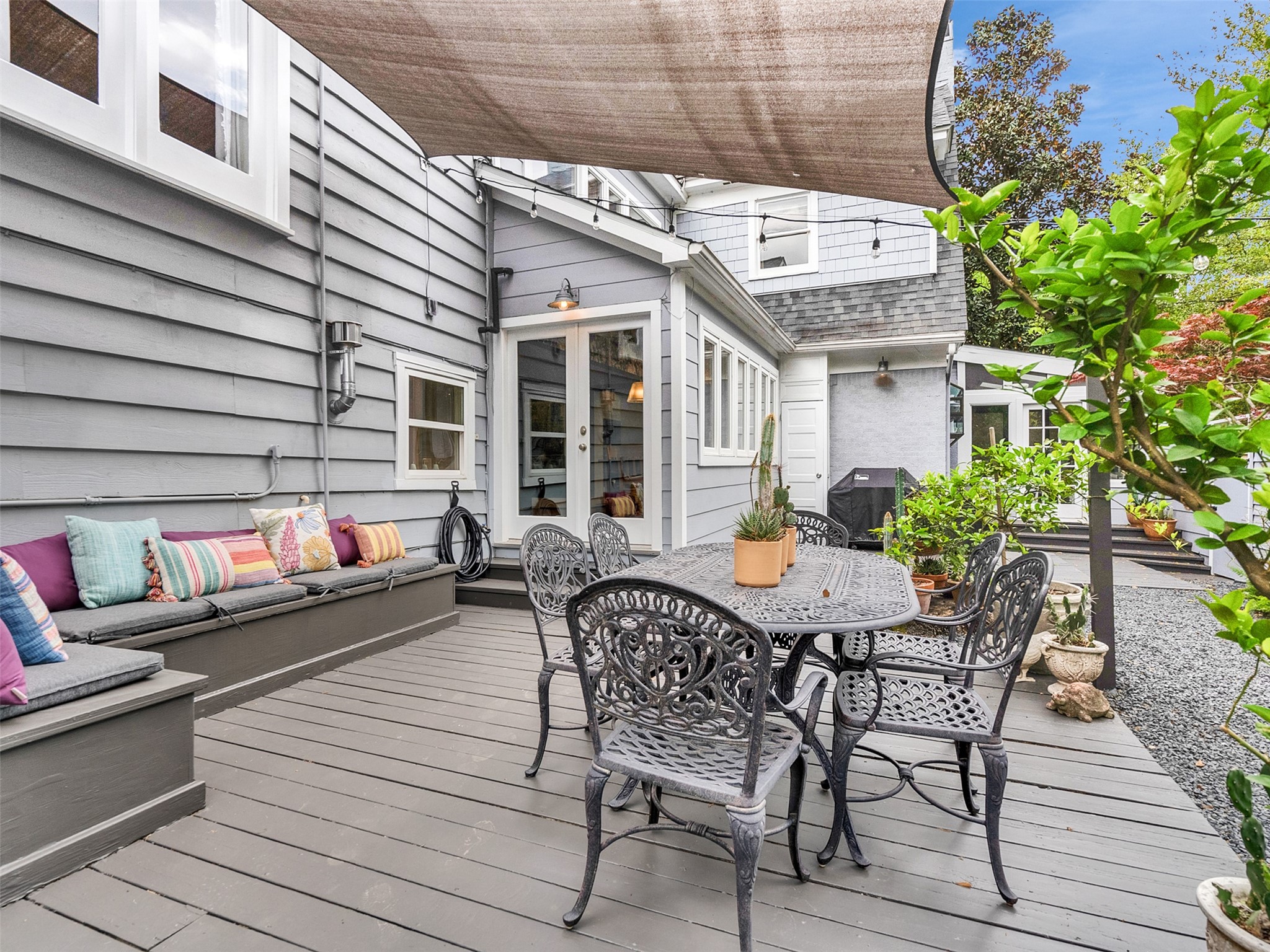 1836 Wroxton Road Houston, TX 77005 - Photo 39 of 42 Great alfresco dining area, decked and draped in twinkle lights.