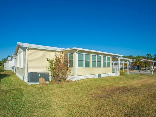 $260,000 | 835 Sapodilla Drive, Barefoot Bay, FL 32976