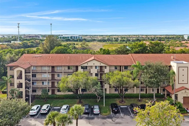 a view of a patio next to a yard
