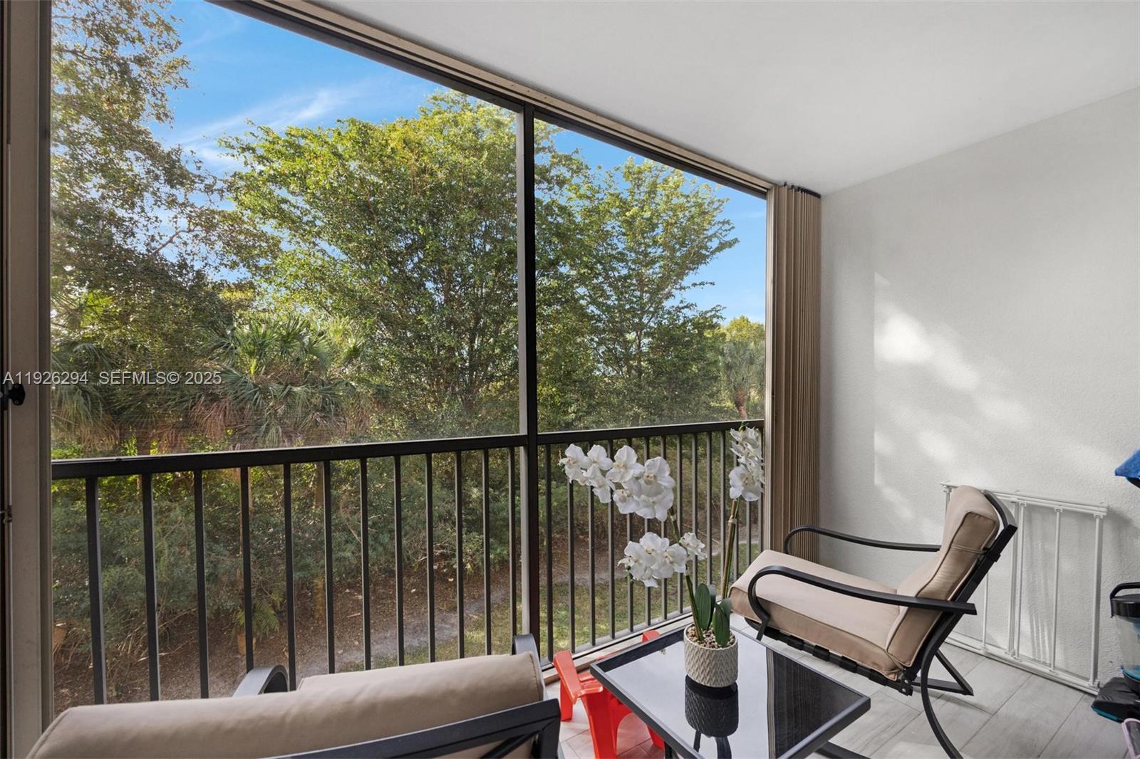 900 Southwest 142nd Avenue, Unit 306L Pembroke Pines, FL 33027 - Photo 33 of 34 a view of a chairs in balcony