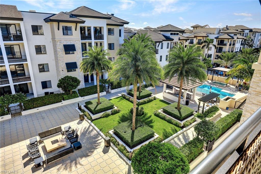 1035 3rd Avenue South, Unit 514 Naples, FL 34102 - Photo 23 of 35 a view of yard with outdoor seating