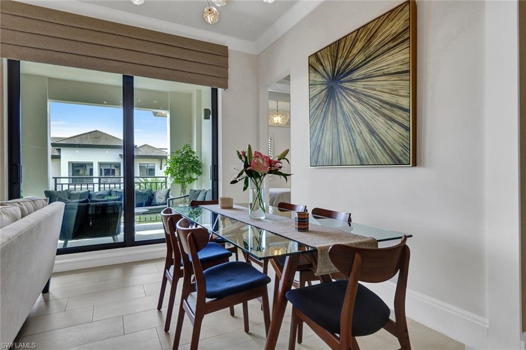 1035 3rd Avenue South, Unit 514 Naples, FL 34102 - Photo 9 of 35 a dining room with furniture and window