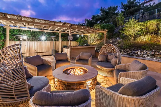 a patio with patio a couch and chairs