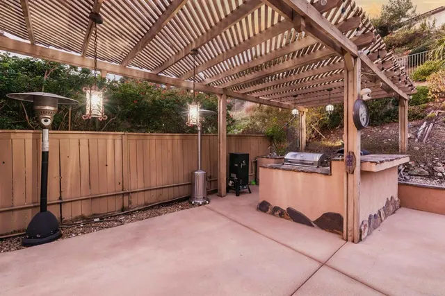 a view of a backyard with trampoline