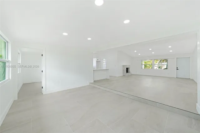 an empty room with windows