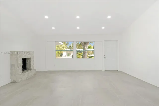 an empty room with windows