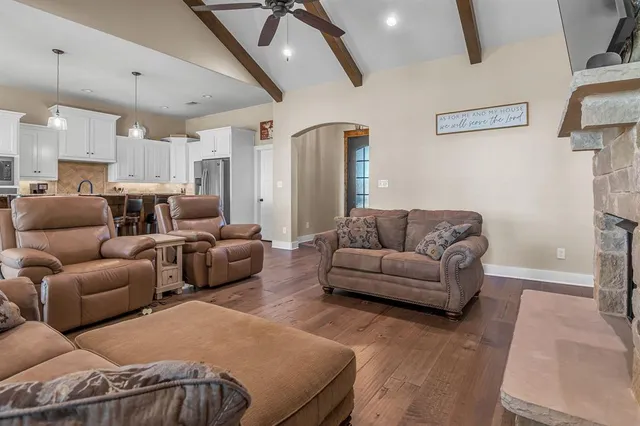 a view of kitchen with cabinets table and chairs