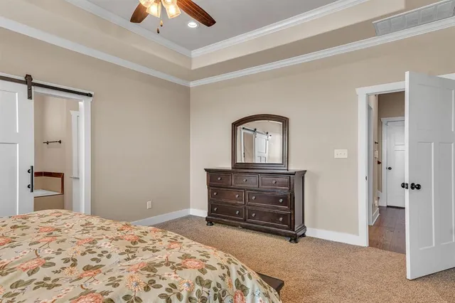 a bathroom with a tub and shower