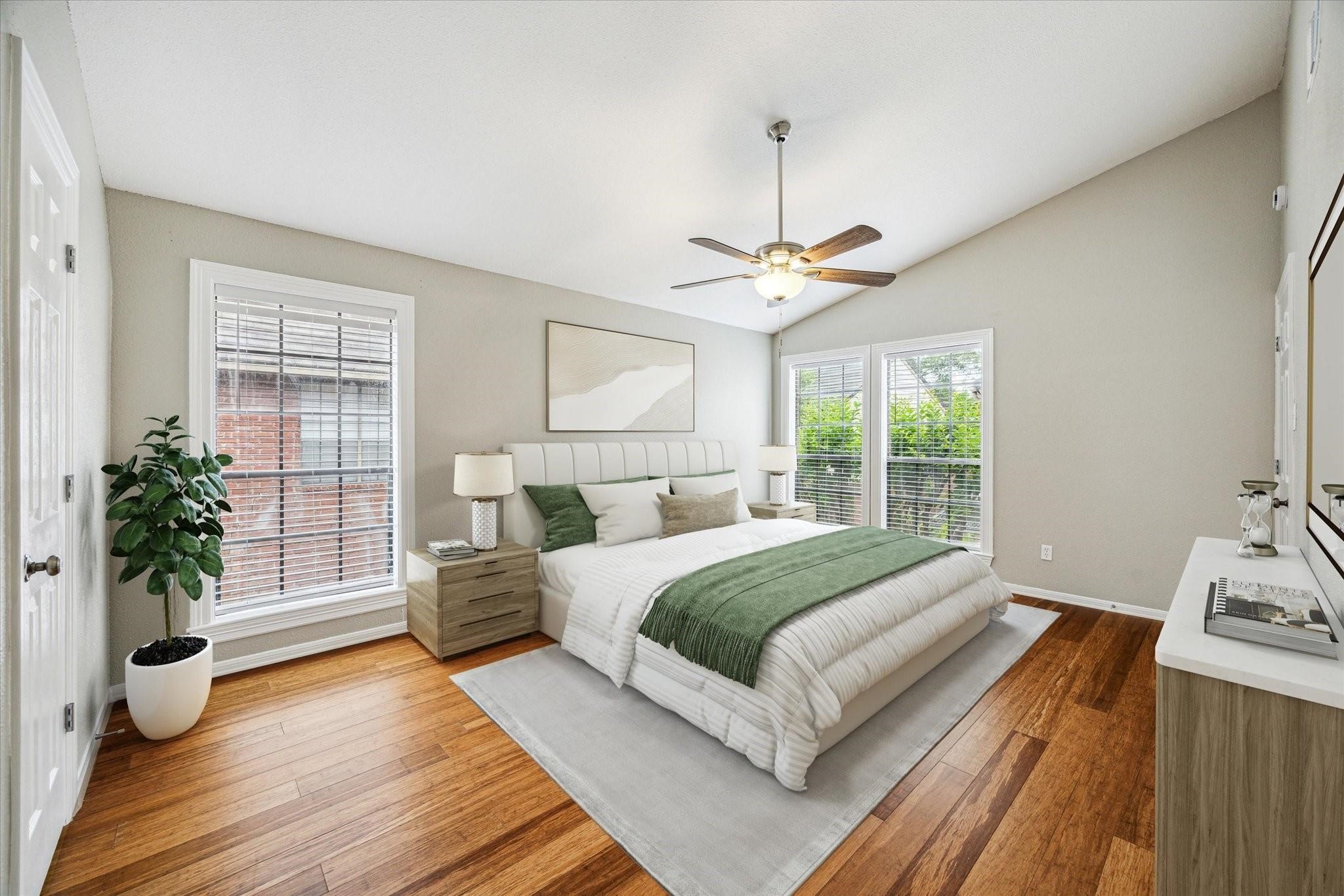 2211 South Kirkwood Road, Unit 9 Houston, TX 77077 - Photo 11 of 16 a spacious bedroom with a bed and a potted plant