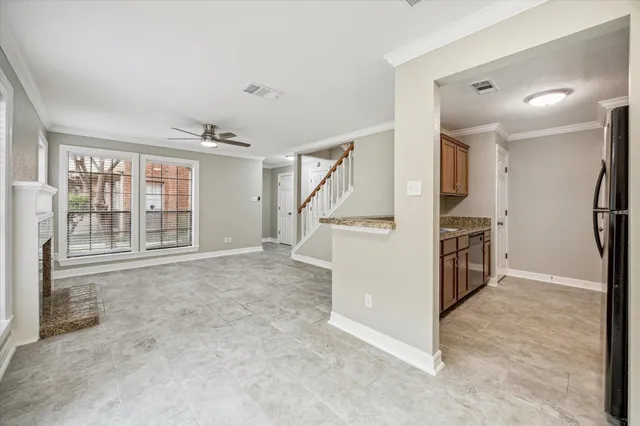 a view of a storage & utility room with stairs