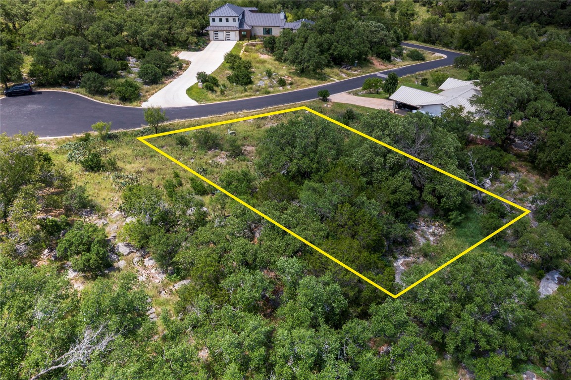 1105 Ute Road Horseshoe Bay, TX 78657 - Photo 7 of 11 Aerial view of property's location featuring property parcel outlined and a forest