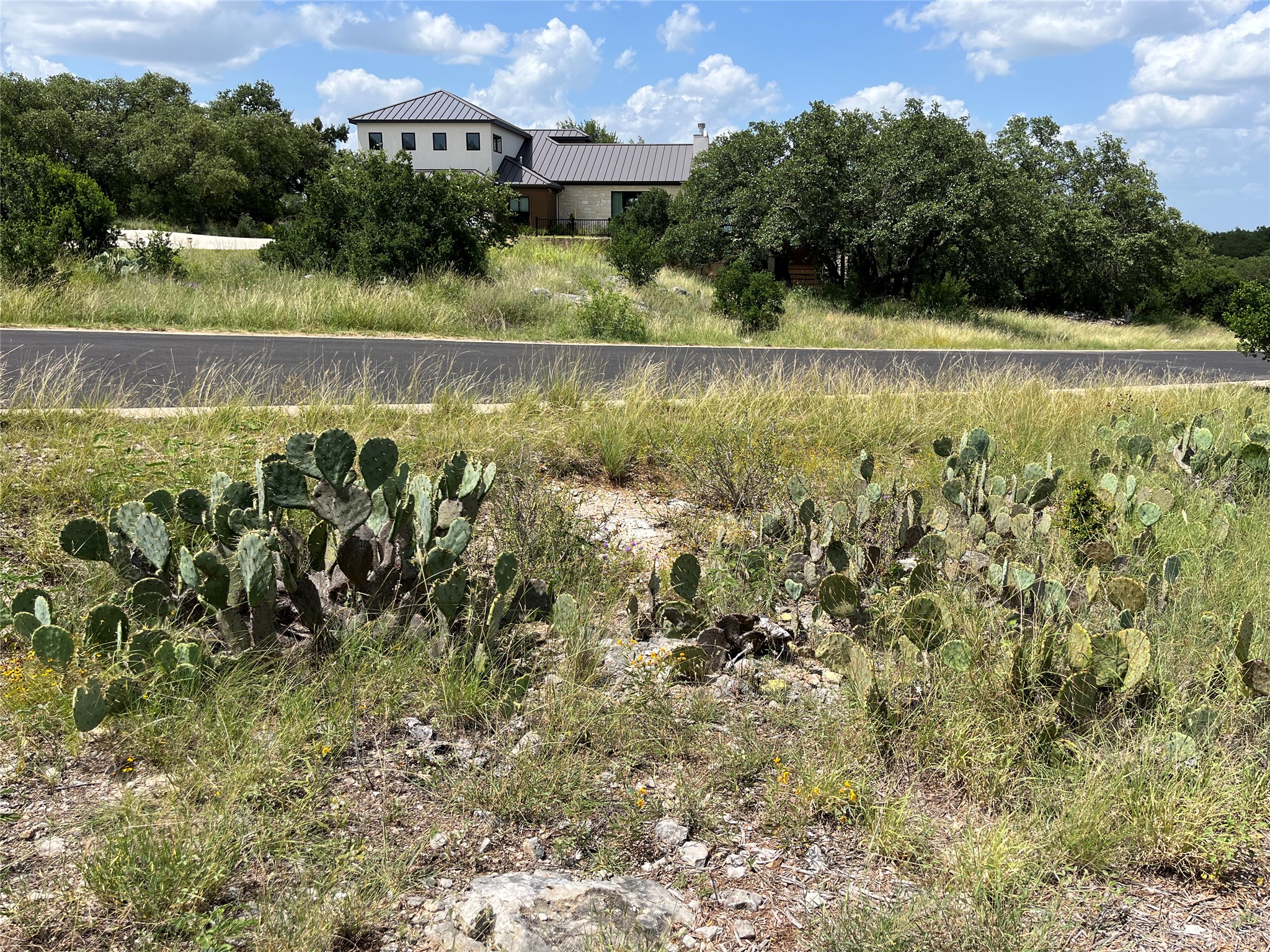 1105 Ute Road Horseshoe Bay, TX 78657 - Photo 10 of 10 a view of a lake with a house in the background
