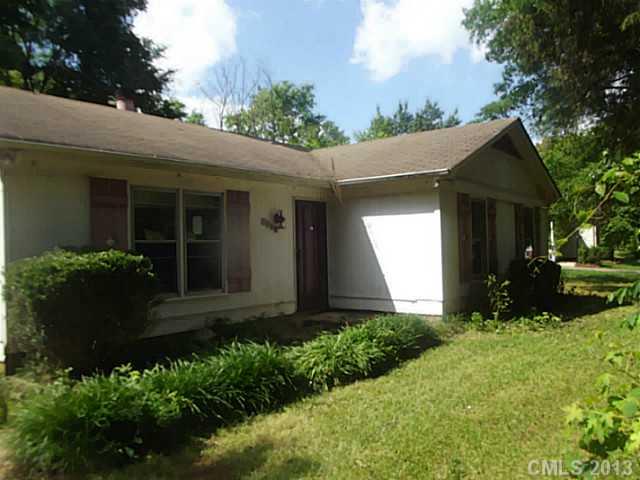 6019 Trotters Ridge Road Charlotte, NC 28227 - Photo 1 of 9 a view of a house with a yard