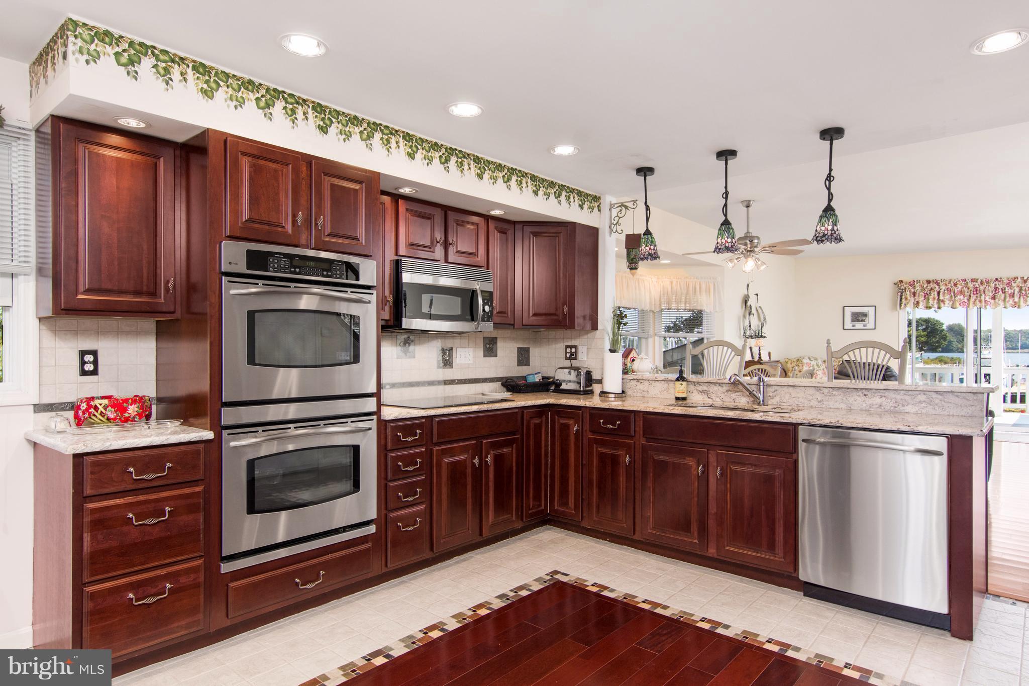 8087 Ventnor Road Pasadena, MD 21122 - Photo 10 of 30 Kitchen opens into greatroom