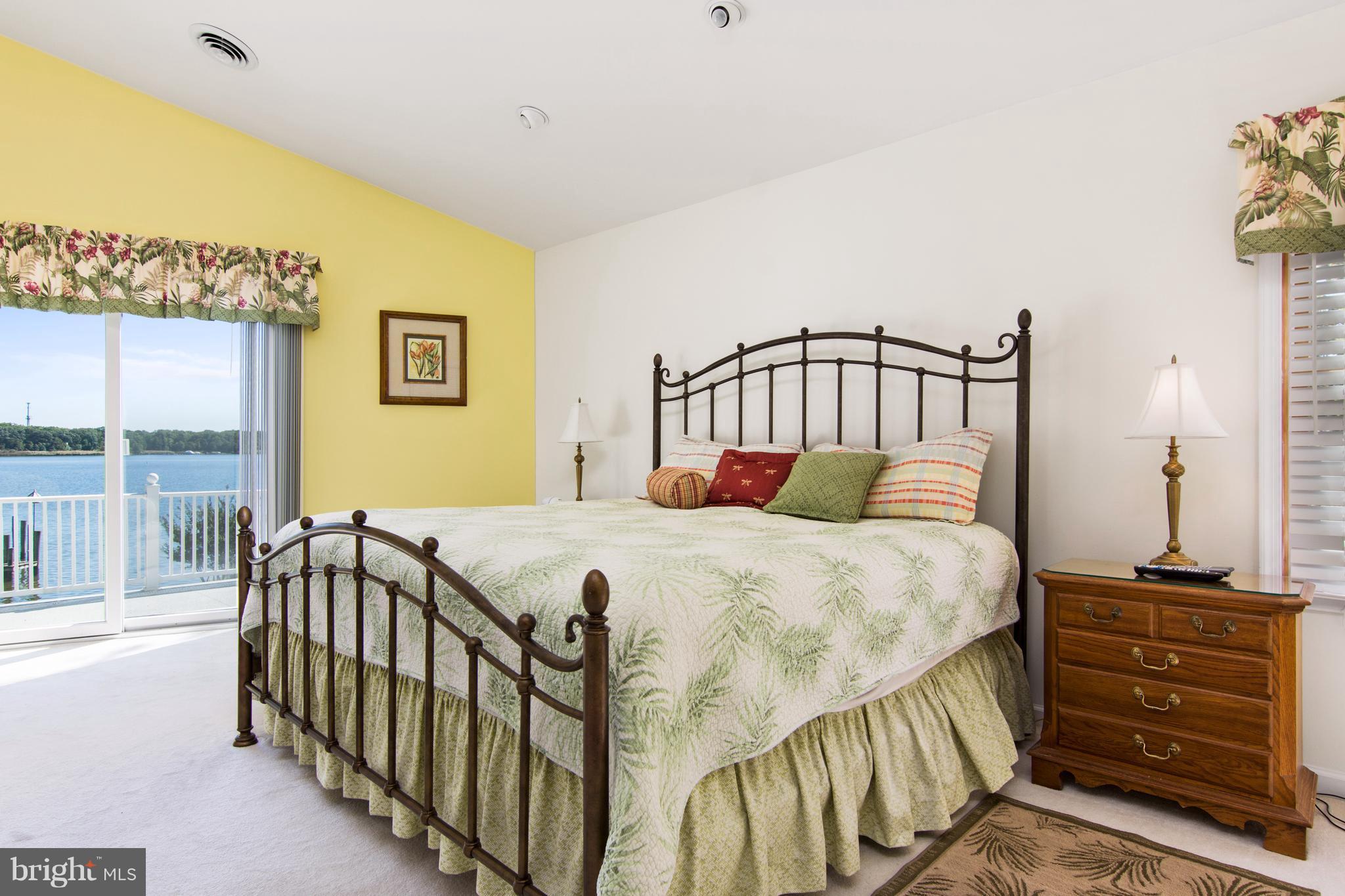 8087 Ventnor Road Pasadena, MD 21122 - Photo 12 of 30 Master bedroom opens onto deck