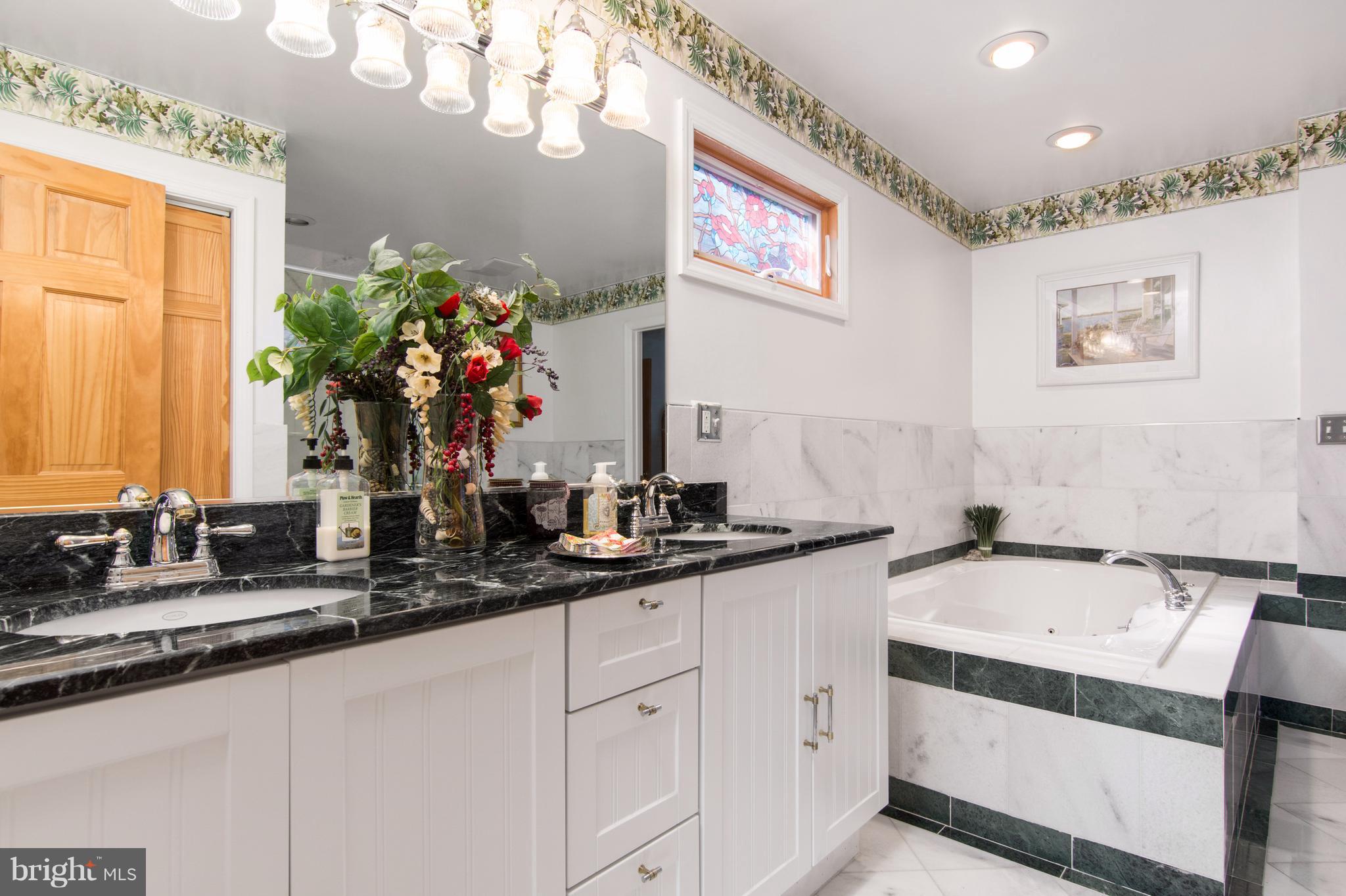 8087 Ventnor Road Pasadena, MD 21122 - Photo 25 of 30 Main level bath with marble & granite