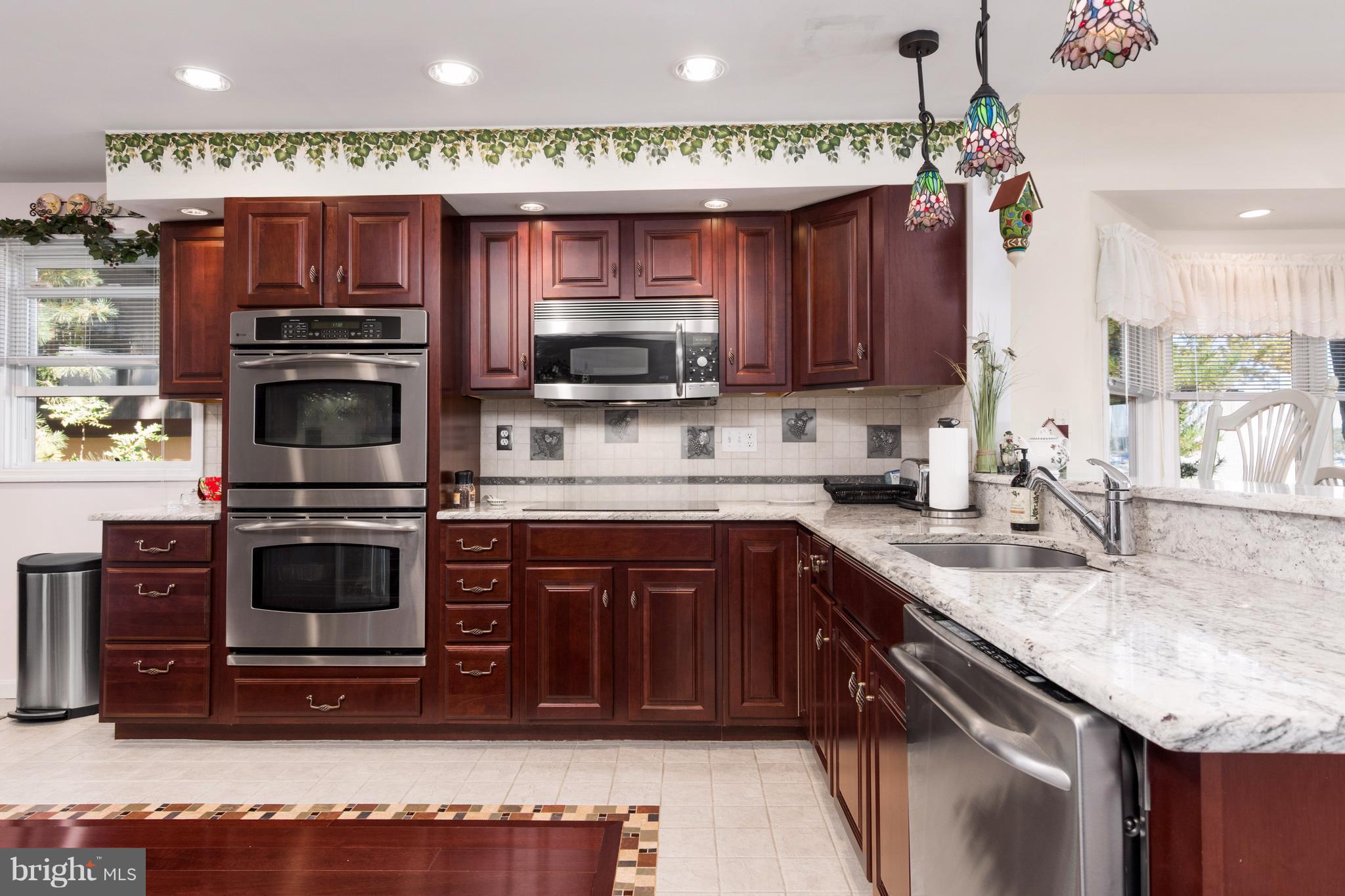 8087 Ventnor Road Pasadena, MD 21122 - Photo 8 of 30 Gourmet Kitchen with granite counters