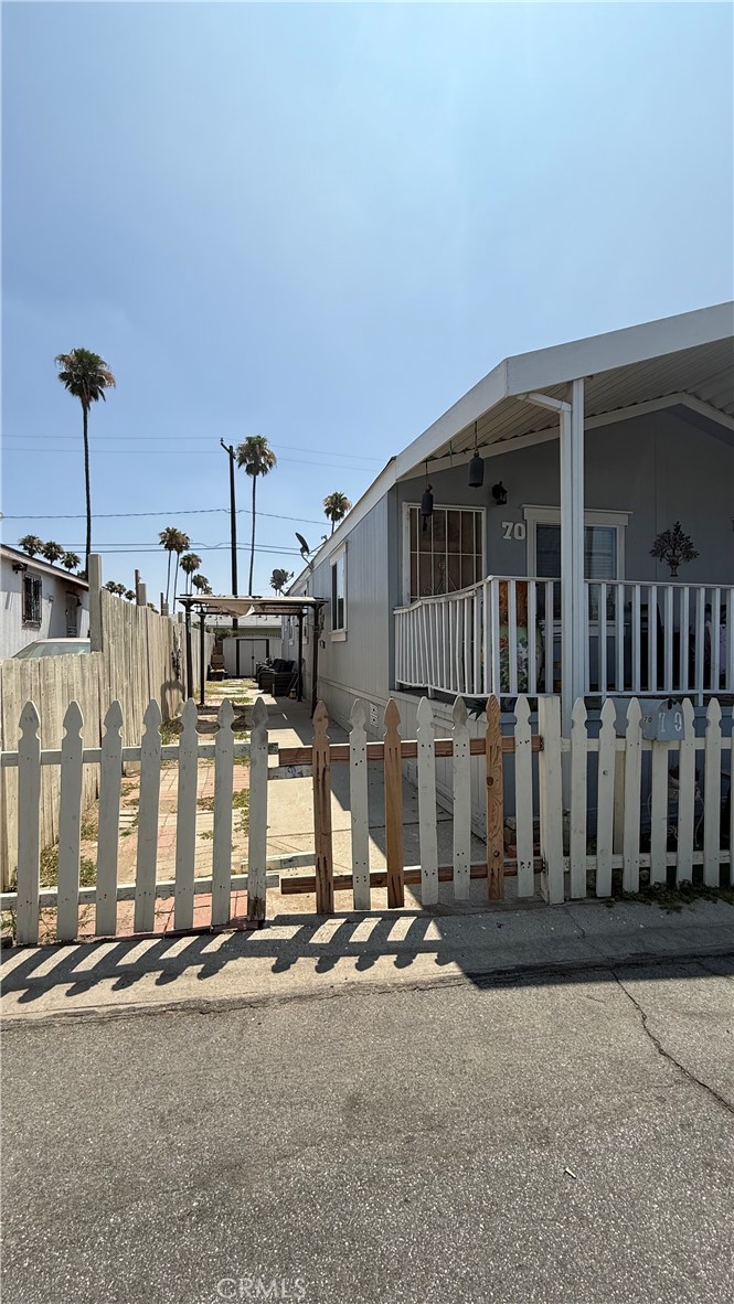 2250 West Mill Street, Unit 70 Colton, CA 92324 - Photo 14 of 14 a view of a house with street