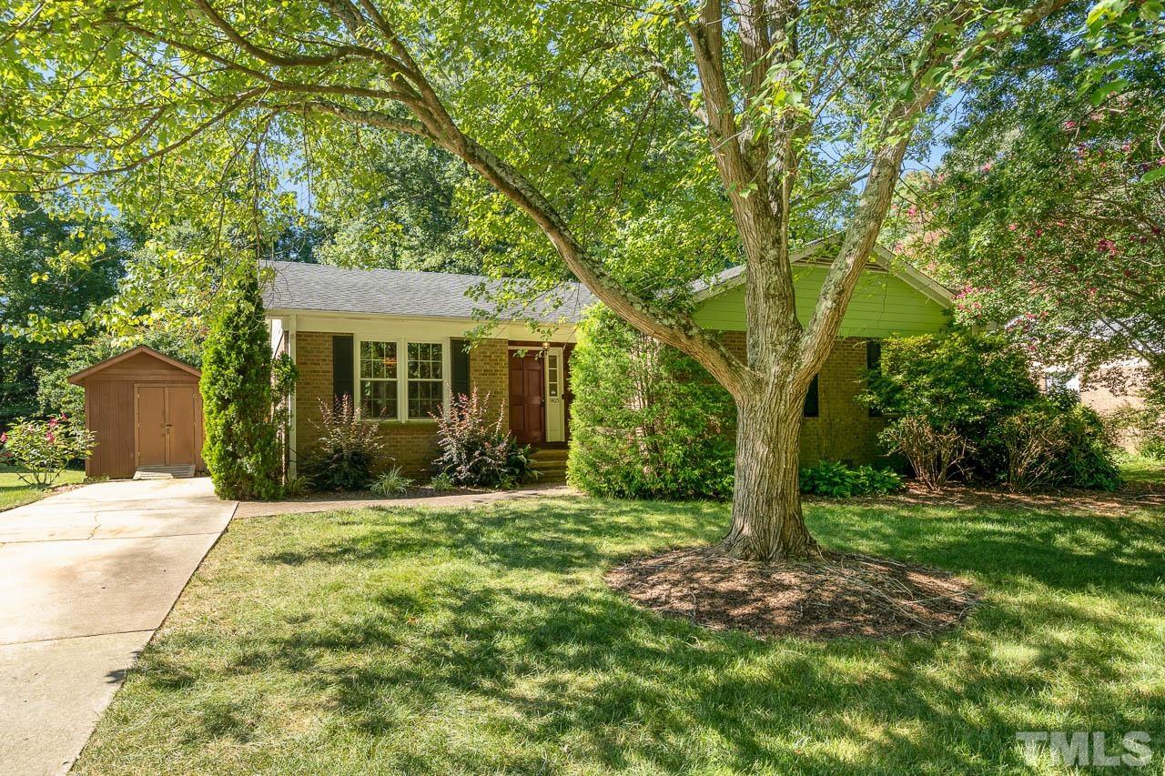 7405 Mine Valley Road Raleigh, NC 27615 - Photo 17 of 24 a front view of a house with a yard