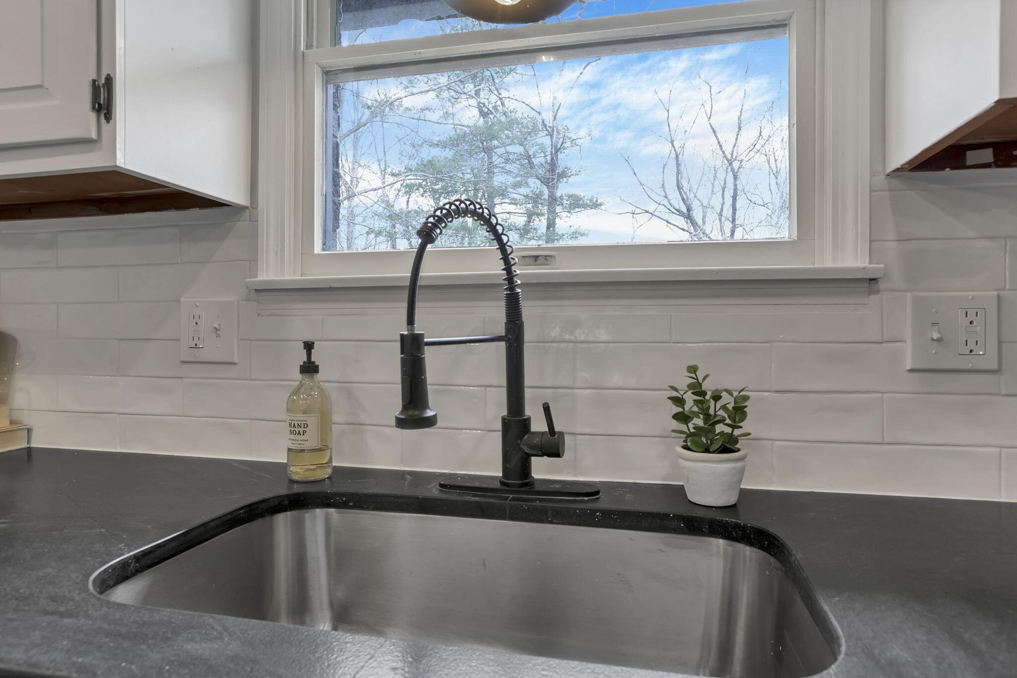 5289 Hazelton-Etna Road Southwest Pataskala, OH 43062 - Photo 19 of 67 New sink, fixtures, backsplash and countertops.