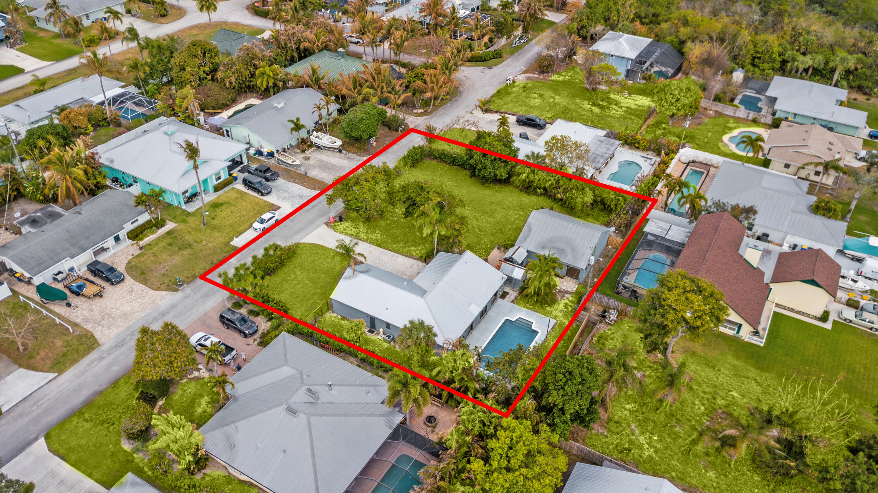 5666 Southeast Matousek Street Stuart, FL 34997 - Photo 4 of 49 Aerial of main and guest home