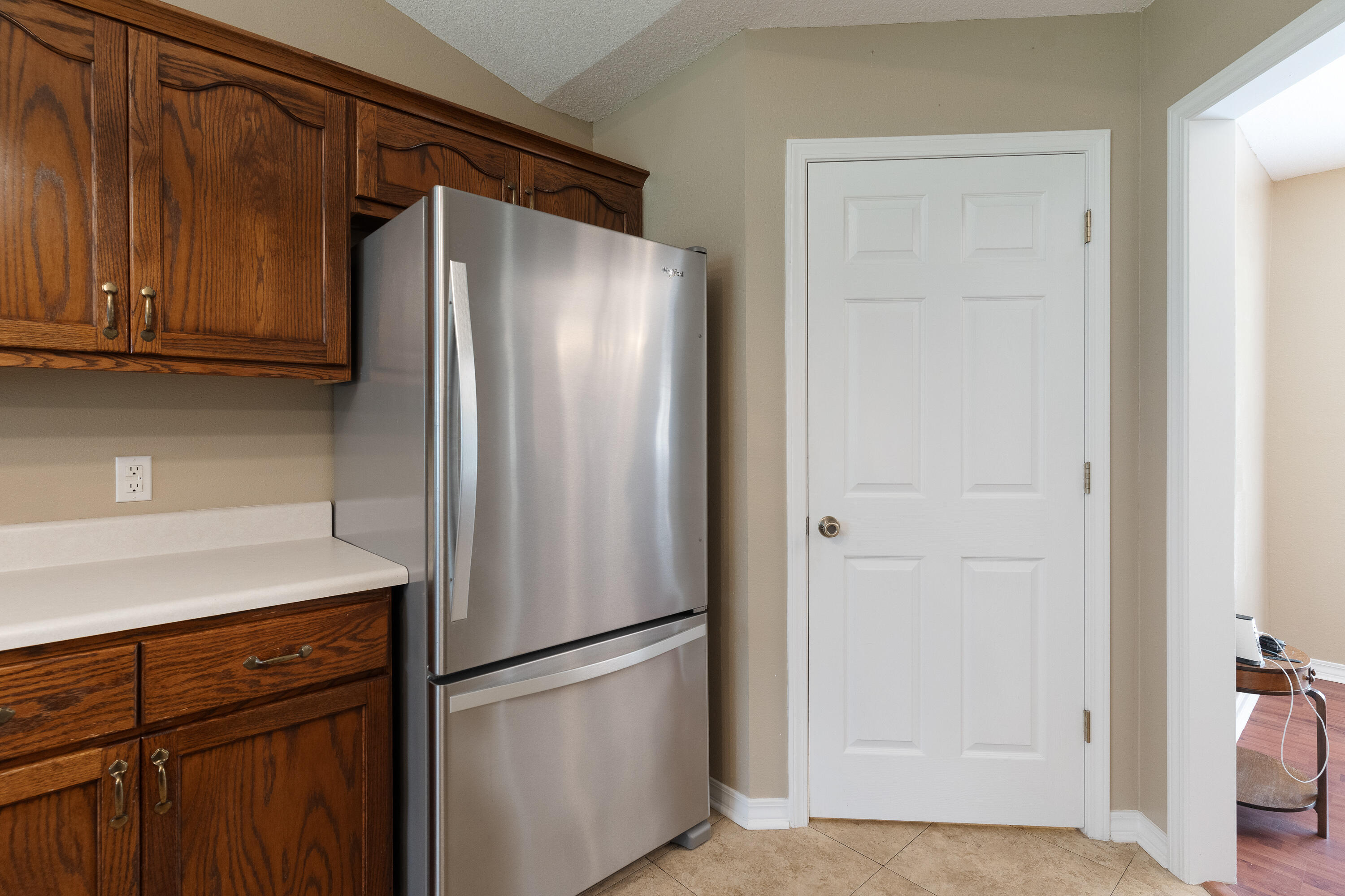6100 Buckward Road Baker, FL 32531 - Photo 34 of 55 a metallic refrigerator freezer sitting in a kitchen
