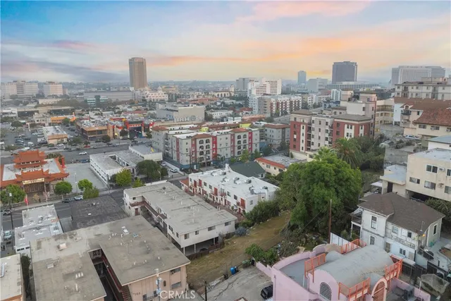 an aerial view of a city with lots of residential buildings