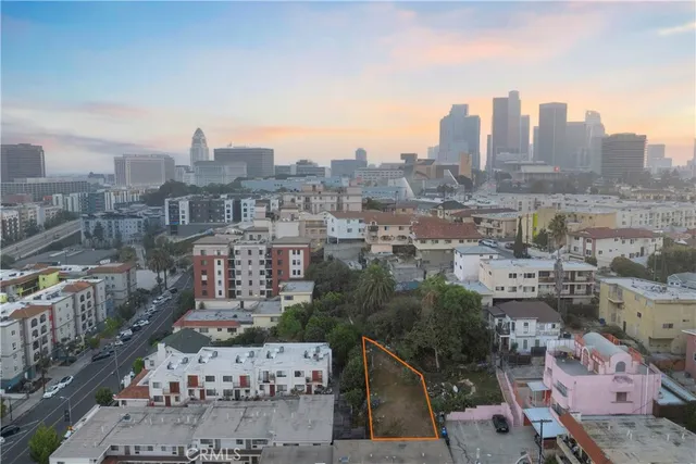 a view of a city with tall buildings