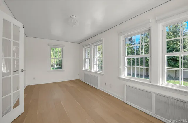 an empty room with windows