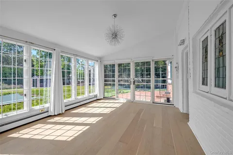 a view of a room with a large window