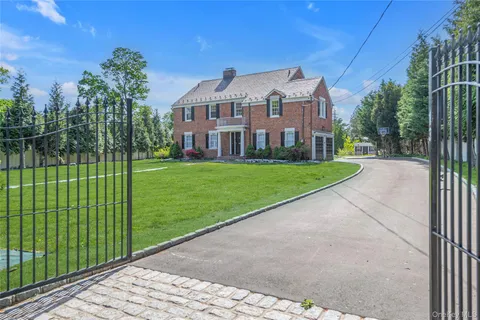 a house view with a garden space