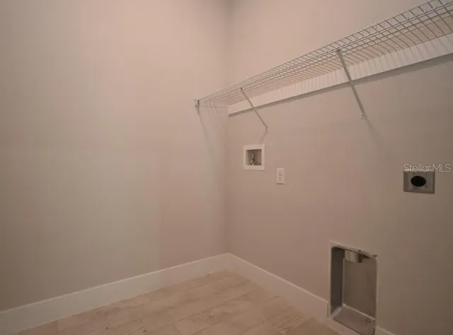 a view of a room with an empty space