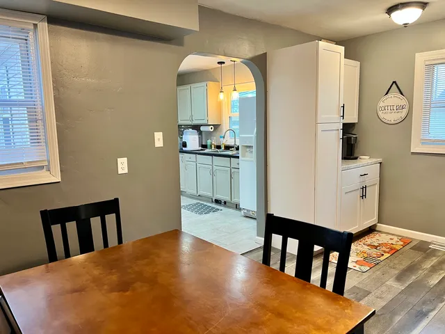 a view of a kitchen from the hallway