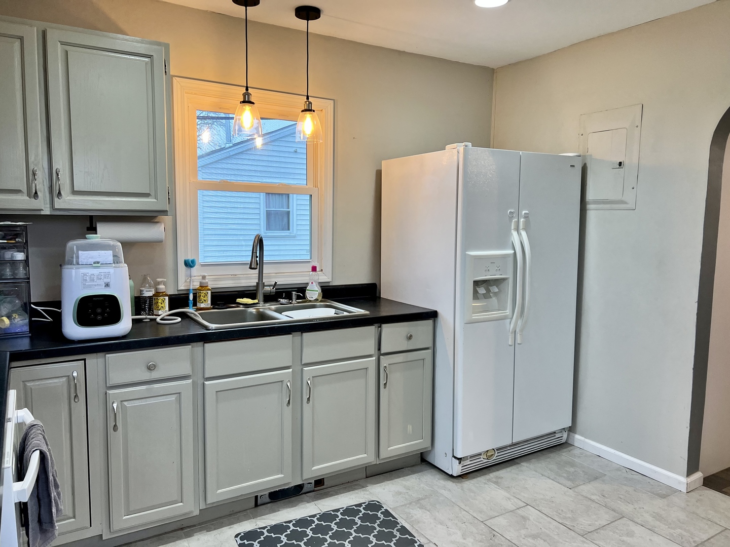 113 Walnut Street Gibson City, IL 60936 - Photo 16 of 33 a kitchen with stainless steel appliances a refrigerator sink and cabinets