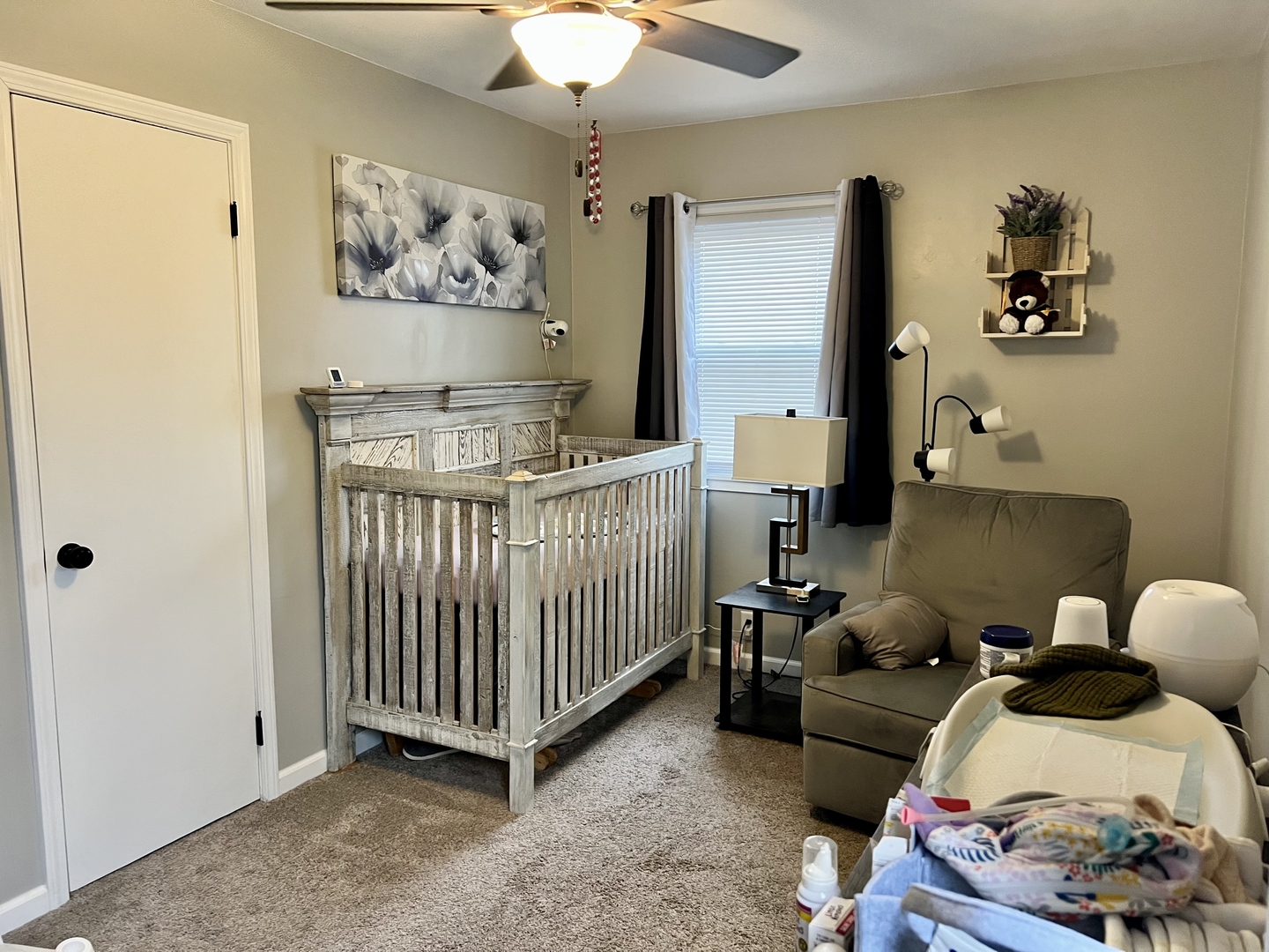 113 Walnut Street Gibson City, IL 60936 - Photo 22 of 33 a bedroom with a bed and wooden floor