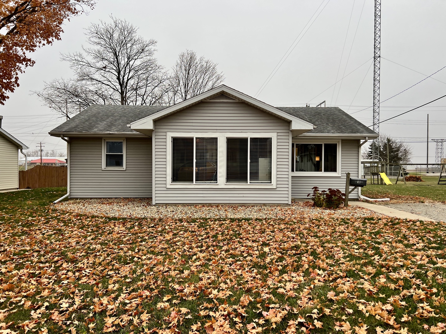 113 Walnut Street Gibson City, IL 60936 - Photo 3 of 33 a house with trees in the background