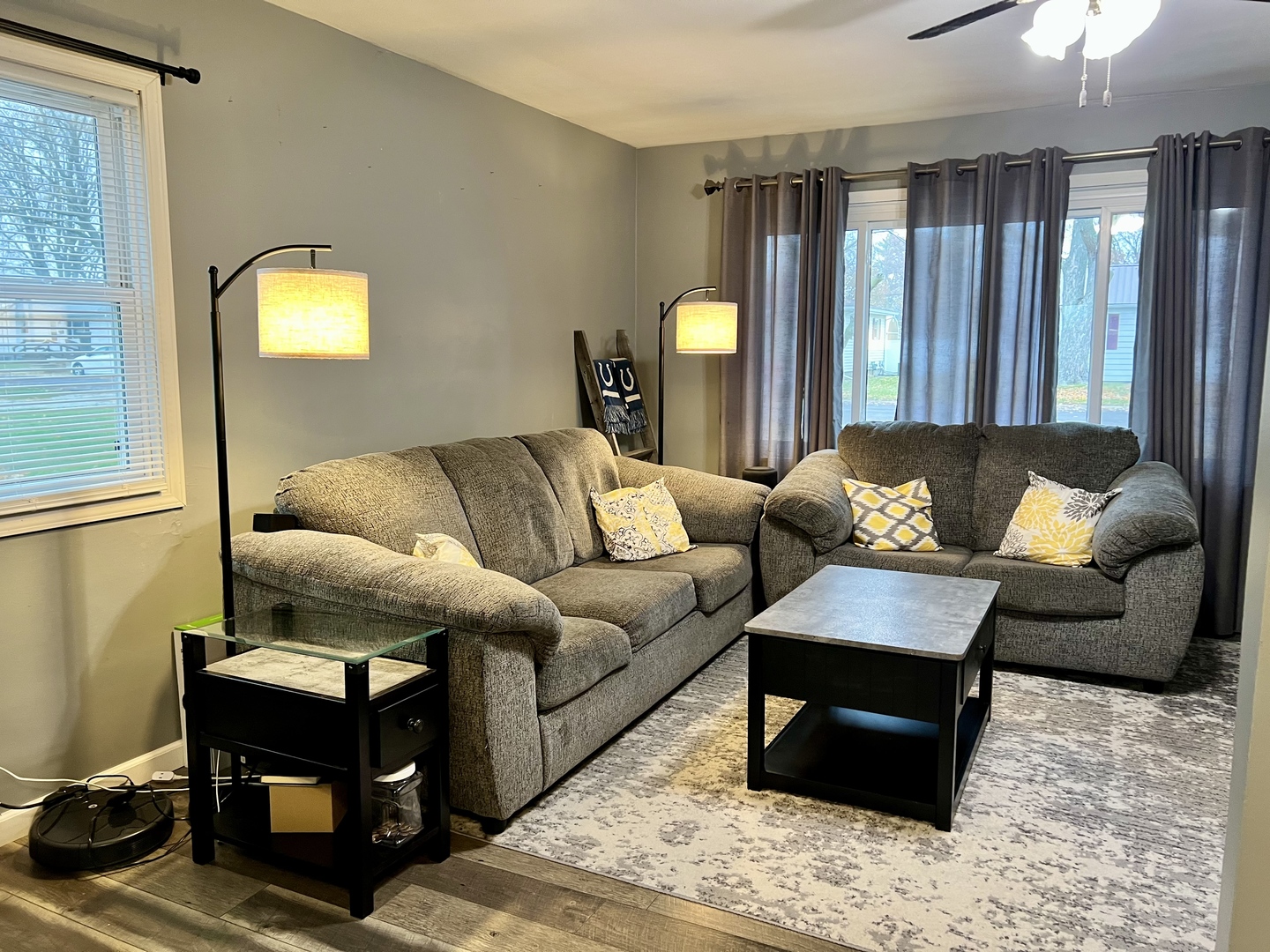 113 Walnut Street Gibson City, IL 60936 - Photo 7 of 33 a living room with furniture and a large window