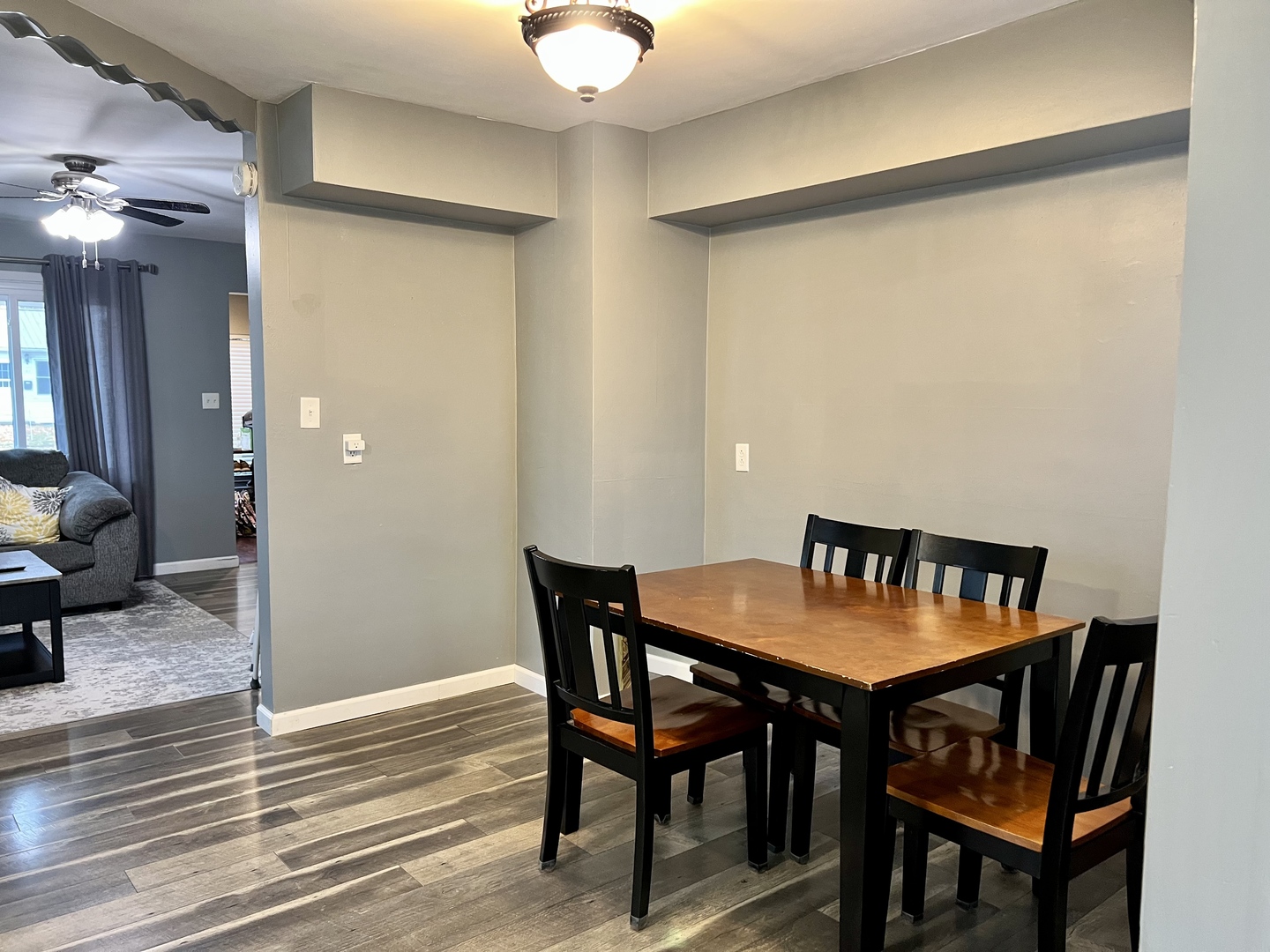 113 Walnut Street Gibson City, IL 60936 - Photo 10 of 33 a view of a dining room with furniture and wooden floor