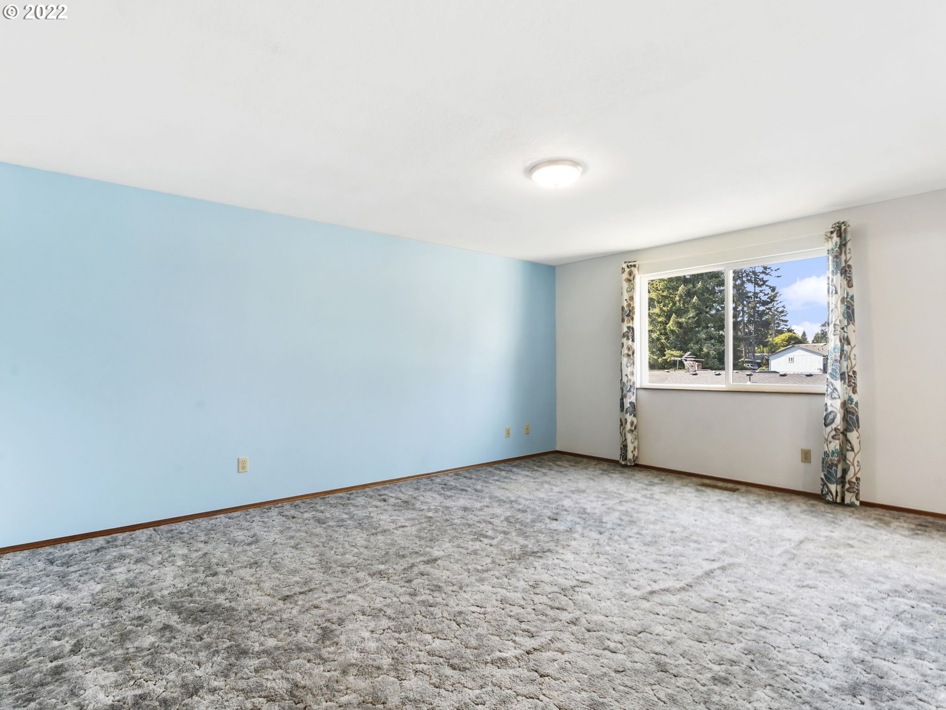 18045 Davis Street Sandy, OR 97055 - Photo 11 of 27 a view of an empty room with a window