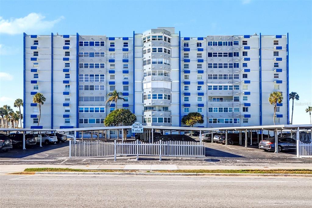 17400 Gulf Boulevard, Unit H2 Redington Shores, FL 33708 - Photo 2 of 36 a view of a building with a swimming pool